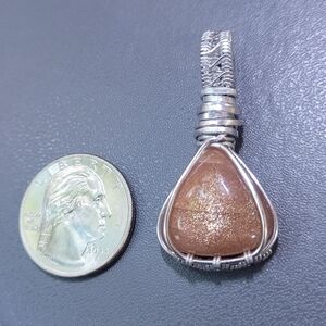 Elegant Silver and Gold Pendant